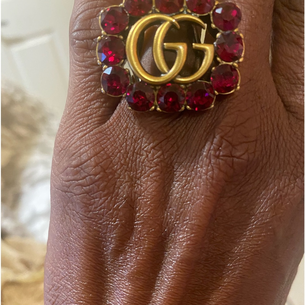 Authentic Gucci Bronze GG Marmount Ring with Interlocking  Red Crystals.
